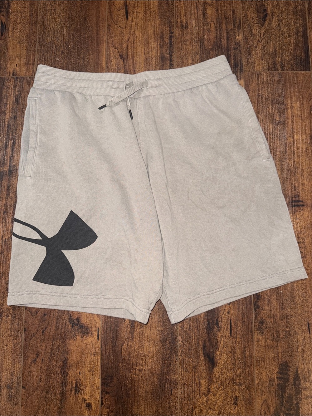 Under Armour Light Gray Athletic Shorts with Black Logo Accent